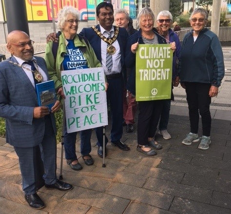 Rochdale and Littleborough Peace Group members with the Mayor and consort (from left: Consort Sultan Ali, Rae Street, Mayor Ali Ahmed, Trevor Hoyle, Mai Chatham, Annie Bracken, Maggie Muir)