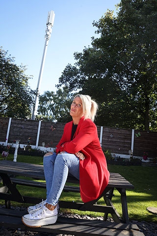 Clare Brophy and 20 metre mast near Rochdale home