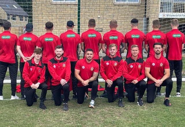 Sacred Heart FC first team wearing new warm up jersey sponsored by Specsavers Rochdale