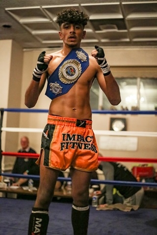 Hakeem Abdullah with the champion belt