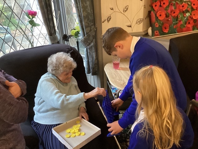 Students from St Luke’s CE Primary School visited residents at Springbank Care Home