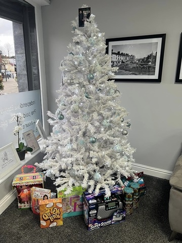 Donations under a Christmas tree at Middleton's Funeral Services