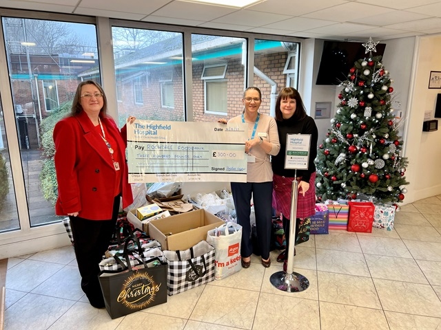 Staff and patients of Highfield Hospital in Rochdale have come together to create a heartwarming collection of presents for the Rochdale Giving Back Christmas Toy Appeal (pictured with Councillor Rachel Massey)