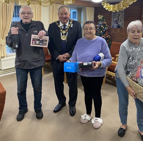 Mayor Mike Holly visited the over 55s retirement scheme where he drew the Christmas raffle