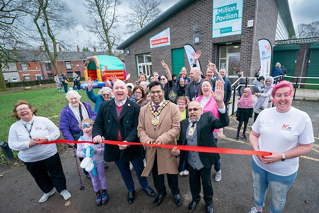 All smiles as Mayor of Rochdale, Councillor Ali Ahmed, cuts the ribbon to officially open Million Pavilion, with local councillors and residents