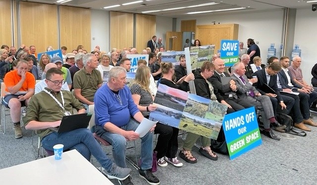 Protestors against the development of Stubley Meadows at the planning committee meeting.