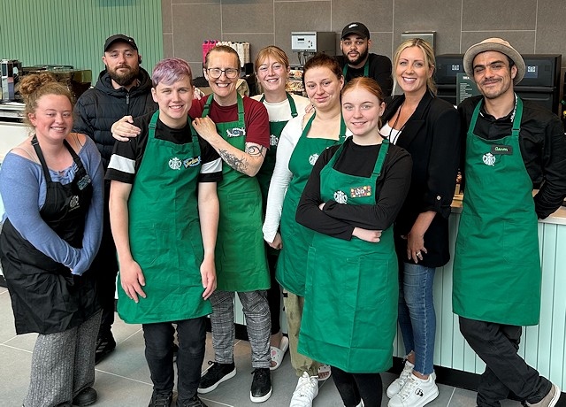 Staff at the new Starbucks store at Rochdale Riverside pictured with Rochdale Riverside's Centre Manager Rachel Byrne