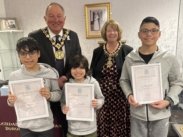 Andrew (right), Ethan (centre) and Collin (left) Perez received certificates from the Mayor and Mayoress, Mike and Margaret Holly