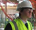 Kenneth Jackson perusing his love of journalism by interviewing the new building site manager 