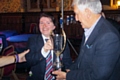 Rochdale Festival of Brass<br /> NWABBA President Malcolm Brownbill presenting the champions trophy to Vicky Lee Ahmed of winning band Blackburn and Darwen