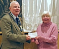 Councillor Wardle presents a £2,000 cheque to Wing Commander David Forbes (retired)