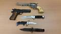 Handguns and knives were recovered from an address in Langley 