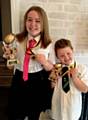 Rugby playing Hollie and Josh Dews with thier 'clubman' trophies