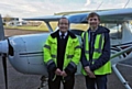 Harry Tait with flight instructor John Cheetham