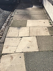 The pavement on Little Clegg Road after Virgin Media expanded their network