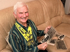 Gordon Aaron looks back on his army days, wearing his two Manchester half-marathon medals