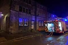 Firefighters were called a fire at a three-storey end-terrace house on Dale Street, Milnrow
