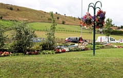 A Pennines in Bloom display on Hollingworth Road