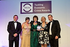 CECA’s team members accepting their TECAs award