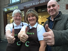Charlie's Café owner Tracy Charlson (centre) and mum Margaret are welcomed to Wardle village by Julian Farnell