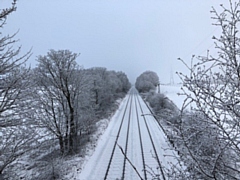 Snow on the railway line at Slattocks in 2019