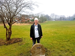 Mark Hope from the Friends of Heritage Green with the newly-installed marker stone