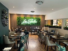 Owners of the Oldham Road restaurant wanted to 'bring the outdoors indoors', with the dining area resembling a fresh botanical garden through added greenery and plants