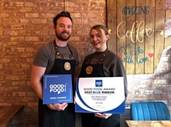 Becky and Danny O'Neill with their award for Busy Beans Coffee