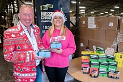Darren Jones from Buy a Battery and Jessica Rigby, charity manager of Cash for Kids