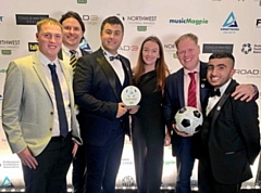 Rochdale AFC Community Trust with their award