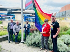 The progress flag was raised for the international day against homophobia, transphobia and biphobia: Councillors Ashley Dearnley, Neil Emmott, Ali Ahmed and Janet Emsley with Carl Austin-Behan