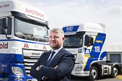 Archbold Logistics managing director Alan Maher alongside some of the company's fleet