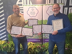 Paul Ellison and Phil Starr with the awards for Norden In Bloom's It's Your Neighbourhood entries