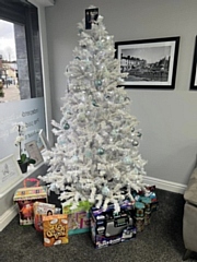 Donations under a Christmas tree at Middleton's Funeral Services