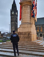 The graffiti on Rochdale Cenotaph before it was removed on 7 November