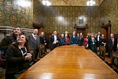 Councillors admire some of the detailing in one of the town hall's newly restored rooms