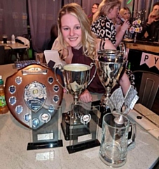 Hannah Mallinson with her trophies gained in autograss racing for Leewood Motor Club