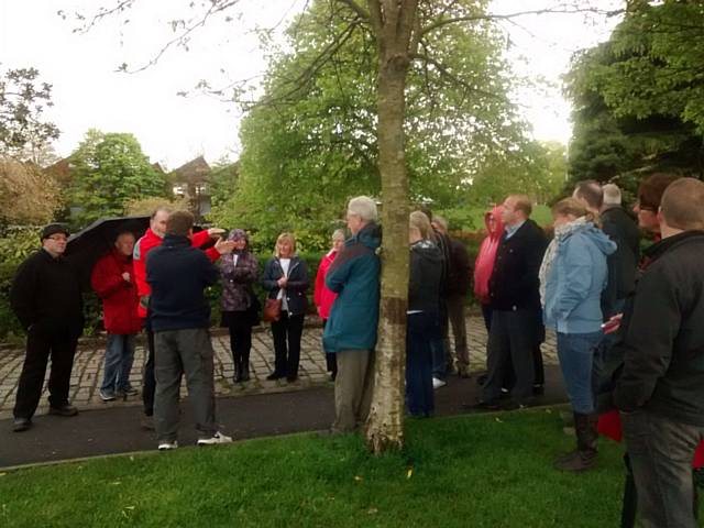 Councillors and members of the public meet council officers and contractors to hear about the flood alleviation works in Hare Hill Park