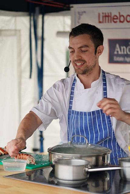 Andy McKay demonstrating his culinary skills.
