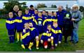Littleborough Juniors Football Club Under 10s Yellow with LEAF Treasurer, Norma Brundell (right)